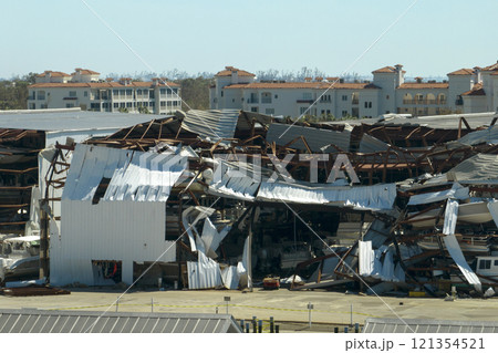 Boat station destroyed by hurricane wind in Florida coastal area. Consequences of natural disaster Boat station destroyed by hurricane wind in Florida coastal area. Consequences of natural disaster 121354521