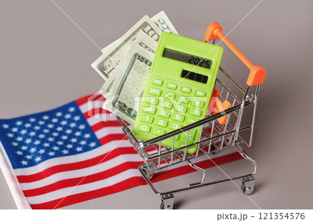 Shopping Cart trolley, Green Calculator, American Flag. Concept Inflation for Grocery Expenses, Consumerism. Cost Living 121354576