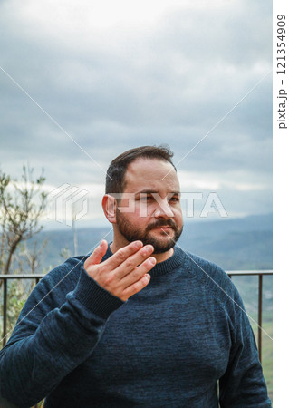 Man Looks Exhausted in Hot Weather 121354909