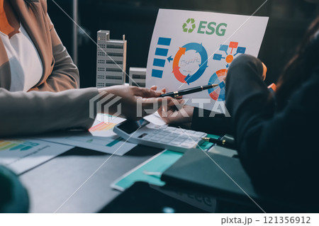 Carbon offset price report CO2 emission. Future growth Net zero waste in ESG ethical SME office protect climate change global warming social issues project. Group of asia people Eco friendly SDGs plan 121356912
