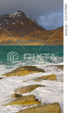 Norwegian Sea and rocky beach. Lofoten islands, Norway Norwegian Sea and rocky beach. Lofoten islands, Norway 121357669