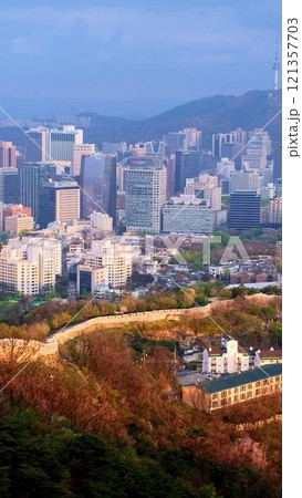 Aerial view of Seoul downtown cityscape and Namsan Seoul Tower on sunset from Inwang mountain. Seoul, South Korea. 121357703