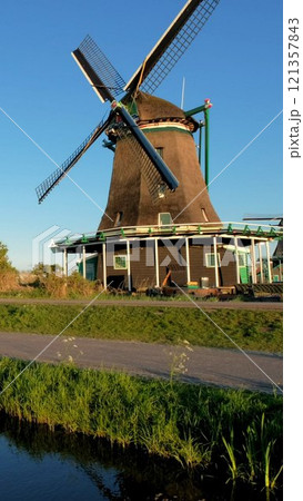 Windmills at famous tourist site Zaanse Schans in Holland. Zaandam, Netherlands Windmills at famous tourist site Zaanse Schans in Holland. Zaandam, Netherlands 121357843