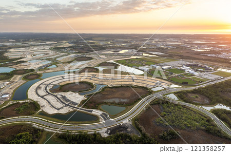 Beginning of construction works on prepared ground. Large building site in American rural area. Development of residential housing in US suburbs. Real estate market in USA 121358257