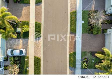 American gated community houses in rural US suburbs. View from above of large residential homes in small town in southwest Florida American gated community houses in rural US suburbs. View from above of large residential homes in small town in southwest Florida 121358384