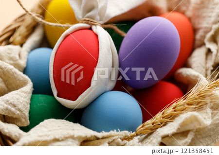 Happy Easer eggs in a basket Happy Easer eggs in a basket 121358451