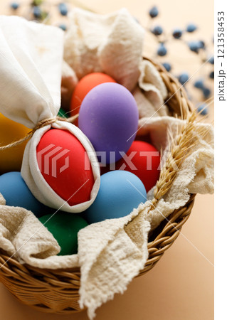 Happy Easer eggs in a basket Happy Easer eggs in a basket 121358453