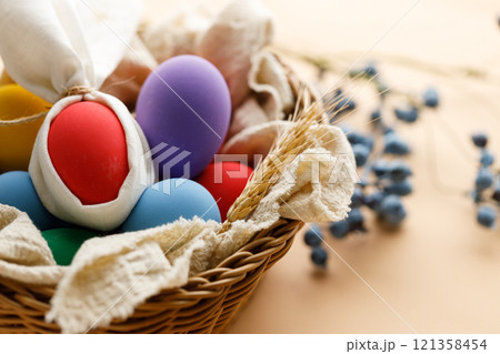 Happy Easer eggs in a basket Happy Easer eggs in a basket 121358454