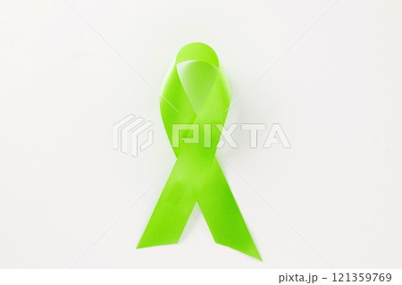 Green awareness ribbon symbol of Gallbladder and Bile Duct Cancer month isolated on white background with copy space, concept of medical and health care support, Cancer awareness, World bipolar day Green awareness ribbon symbol of Gallbladder and Bile Duct Cancer month isolated on white background with copy space, concept of medical and health care support, Cancer awareness, World bipolar day 121359769