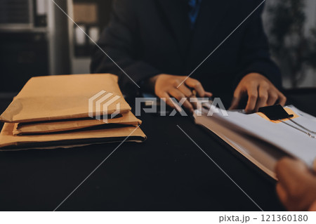 Judge gavel with Justice lawyers having team meeting at law firm background. Concepts of Law and Legal services. Judge gavel with Justice lawyers having team meeting at law firm background. Concepts of Law and Legal services. 121360180