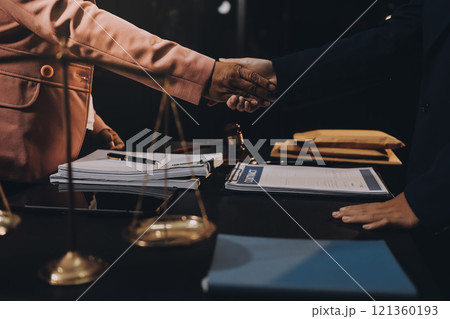 Judge gavel with Justice lawyers having team meeting at law firm background. Concepts of Law and Legal services. Judge gavel with Justice lawyers having team meeting at law firm background. Concepts of Law and Legal services. 121360193