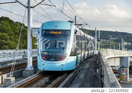 A train traveling on the Danhai Light Rail transit (LRT) in New Taipei City, Taiwan. A train traveling on the Danhai Light Rail transit (LRT) in New Taipei City, Taiwan. 121364092