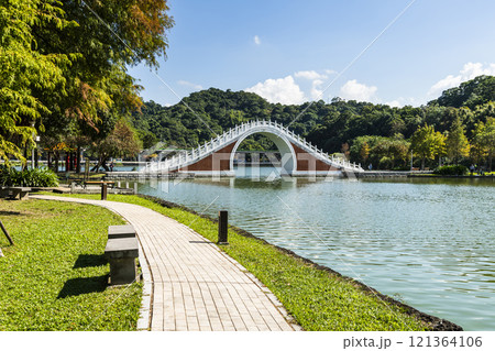 Beautiful Jindai Bridge and lakeside landscape in Taipei Dahu Park, Taiwan. Beautiful Jindai Bridge and lakeside landscape in Taipei Dahu Park, Taiwan. 121364106