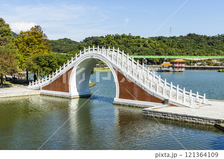 Close-up of Jindai Bridge across the lake of Dahu Park in Taipei, Taiwan. Close-up of Jindai Bridge across the lake of Dahu Park in Taipei, Taiwan. 121364109