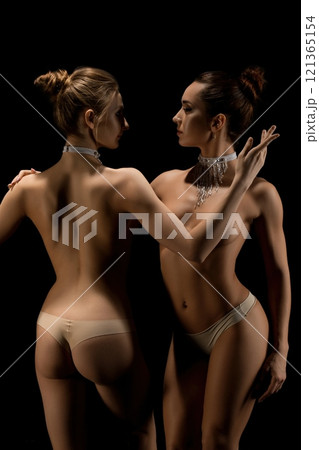 Two beautiful women topless shot Two beautiful women topless shot 121365154
