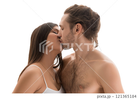 Shirtless man kissing pregnant woman Shirtless man kissing pregnant woman 121365184