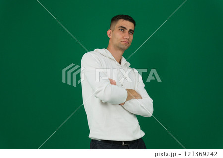 Smiling confident latin hispanic mature business man standing crossed arms isolated on white background. Older senior businessman professional ceo, coach, leader looking at camera. Banner, copy space 121369242