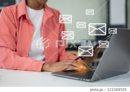 Email notification concept, Female use smartphone and laptop receive message alert in the mailbox. 121369505