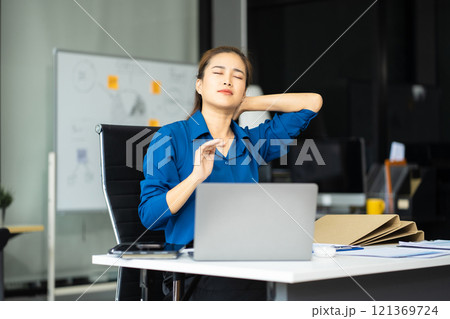 Business woman working at office with laptop and documents on desk, financial adviser analyzing data Business woman working at office with laptop and documents on desk, financial adviser analyzing data 121369724