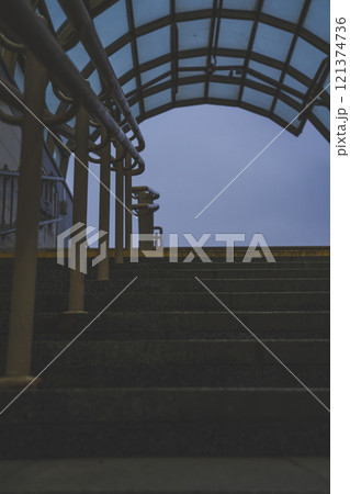 Exit from the underpass in the evening. Cloudy sky. Steps up 121374736