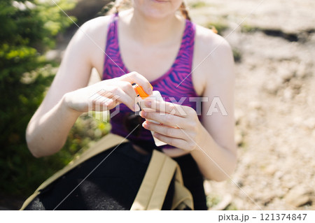 Woman smile applying sun cream on face. Skincare. Body Sun protection. sunscreen. Female smear moisturizing lotion on skin 121374847