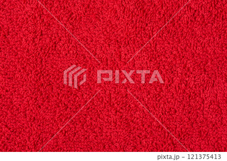 Red terry cloth as a background macro photo. 121375413