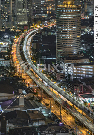 Night scene of light trails of cars on the road of Bangkok city. Night scene of light trails of cars on the road of Bangkok city. 121376739