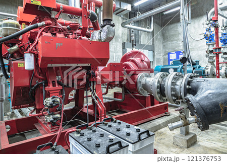 Fire protection system of Condominium. Red generator pump for water sprinkler piping and Fire alarm control system. Fire protection system of Condominium. Red generator pump for water sprinkler piping and Fire alarm control system. 121376753