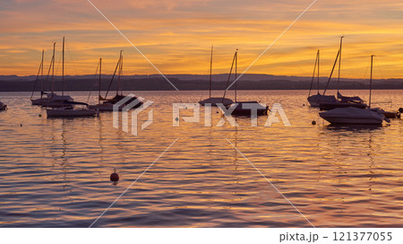 Bodensee Lake Sunrise Panorama. Morning Sunlight Over Tranquil Waters. 121377055