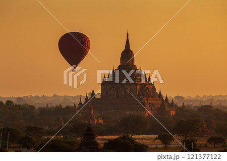Balloon over plain of Bagan in misty morning, Myanmar 121377122