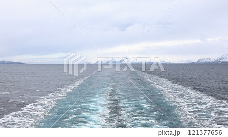 Tromso Approach. The view taken from a ship as it approaches Tromso. Tromso is a city on the island of Tromsoya in Northern Norway. 121377656