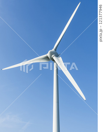 Close-up of wind power systems with a blue sky background on the west coast of Taiwan. Close-up of wind power systems with a blue sky background on the west coast of Taiwan. 121377946