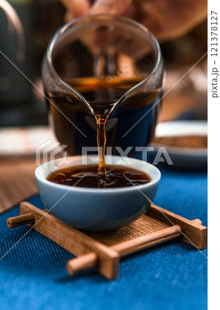 Pouring Freshly Brewed Coffee into a Cup A Beautifully Inviting Moment to Savor and Enjoy Pouring Freshly Brewed Coffee into a Cup A Beautifully Inviting Moment to Savor and Enjoy 121378127