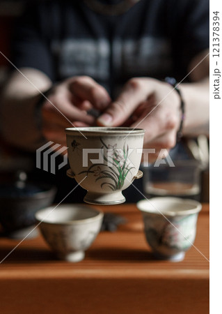 Participate in a captivating Tea Ceremony using exquisite, Traditional Chinese Tea Cups Participate in a captivating Tea Ceremony using exquisite, Traditional Chinese Tea Cups 121378394