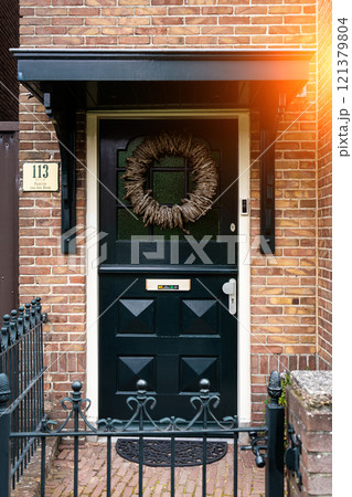 Typical dutch door. Dutch holland architectural detail, a door in Netherlands city. Dutch door 121379804