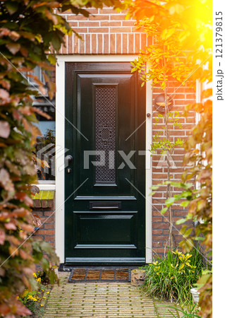 Typical dutch door. Dutch holland architectural detail, a door in Netherlands city. Dutch door Typical dutch door. Dutch holland architectural detail, a door in Netherlands city. Dutch door 121379815