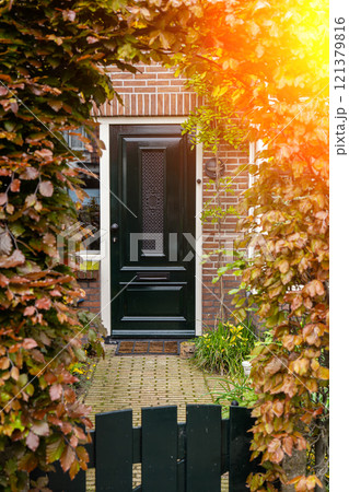 Typical dutch door. Dutch holland architectural detail, a door in Netherlands city. Dutch door Typical dutch door. Dutch holland architectural detail, a door in Netherlands city. Dutch door 121379816