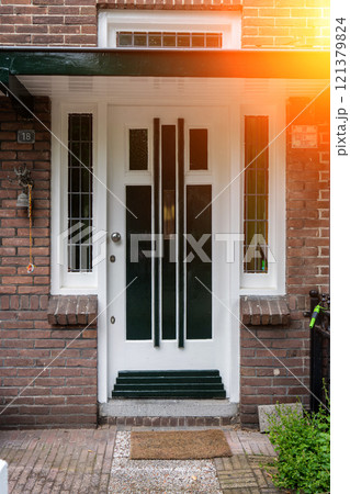 Typical dutch door. Dutch holland architectural detail, a door in Netherlands city. Dutch door Typical dutch door. Dutch holland architectural detail, a door in Netherlands city. Dutch door 121379824