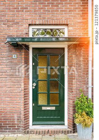 Typical dutch door. Dutch holland architectural detail, a door in Netherlands city. Dutch door 121379850