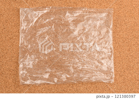 Packaging bag on cork background. 121380397