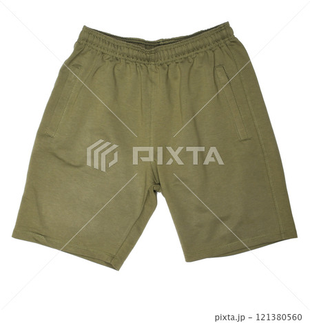 Green shorts on white background. Child Sport shorts. Green shorts on white background. Child Sport shorts. 121380560