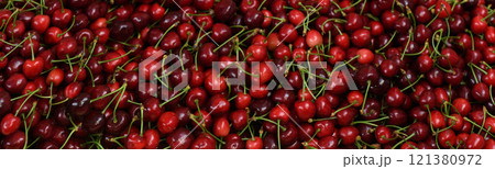 Many ripe sweet cherries as background, closeup. Studio banner, red sweet cherries. Many ripe sweet cherries as background, closeup. Studio banner, red sweet cherries. 121380972