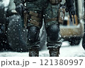 Legs of soldier in winter gear with knee pads. 121380997