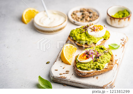 Toast with avocado 121381299