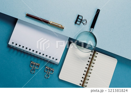 Set of stationery tools on a blue background, flatlay Set of stationery tools on a blue background, flatlay 121381824