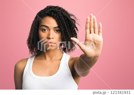Enough, Time To Stop. Serious african american woman showing palm or no gesture, being disappointed Enough, Time To Stop. Serious african american woman showing palm or no gesture, being disappointed 121381931