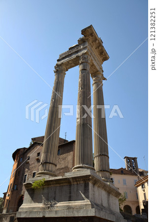 Ionic Columns of the Temple of Saturn in the Forum Romanum, Rome, Italy, clear blue sky sunny day Ionic Columns of the Temple of Saturn in the Forum Romanum, Rome, Italy, clear blue sky sunny day 121382251