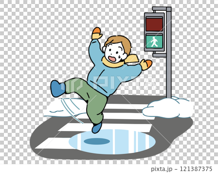 A boy slips and falls on a snowy crosswalk 121387375