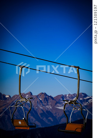landscape with mountains and snow, a ski resort in the mountains landscape with mountains and snow, a ski resort in the mountains 121389197