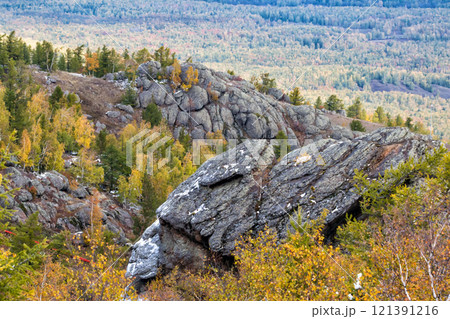 Rocky mountain ranges in autumn forest Rocky mountain ranges in autumn forest 121391216